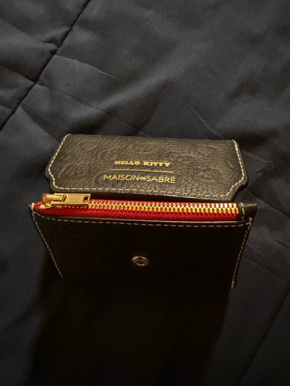 Maison de Sabre
Hello Kitty Leather Trifold Wallet